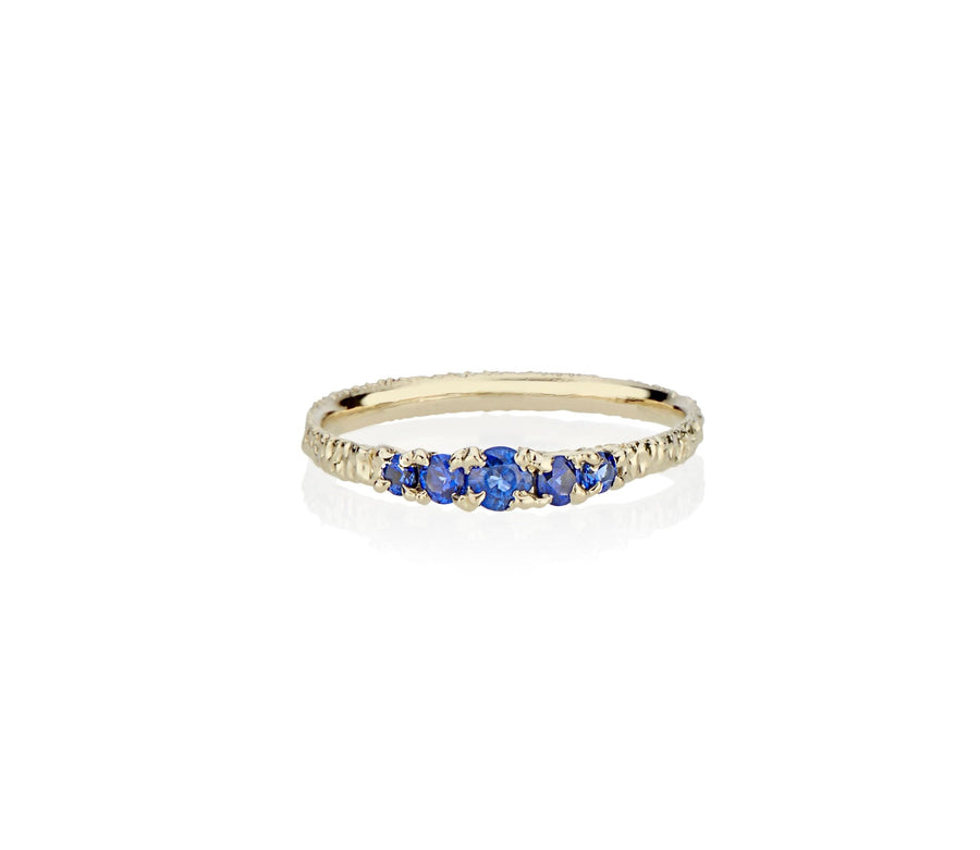 A modern take on victorian style jewelry in this five sapphire ring stack made in nyc by model jayne moore jewelry designer jayne moore from recycled metal 
